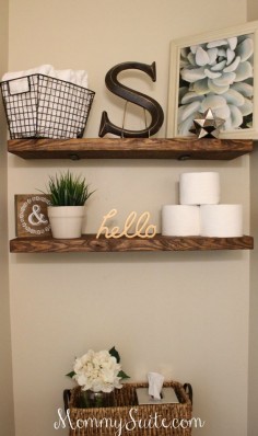 I love the simple styling of these bathroom shelves!