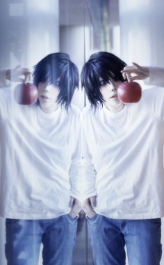 L - Death Note  Throw on some jeans, a long sleeve white shirt, and get some smoky makeup all around your eye. Bring an apple as a prop or wear a black wig to really complete it!