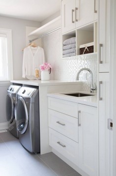 Laundry Room-I love the white backsplash in this room. Lots of light and clean lines.