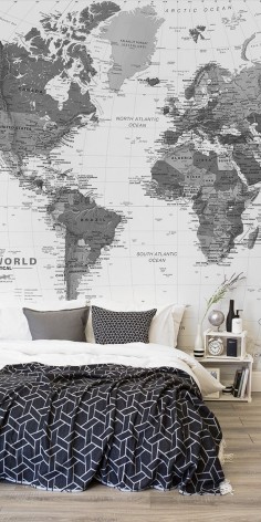 Love monochrome interiors? This stunning black and white bedroom is brought together with a larger than life map mural. Bursting with detail and character, this wallpaper mural is both breathtaking and sophisticated. || @Melody Patton