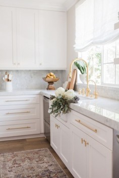 Love the marble with the gold fixtures!