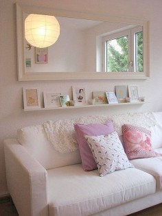 love this alternative to large art above the couch - large scale mirror with shelf for smaller art pieces or pictures
