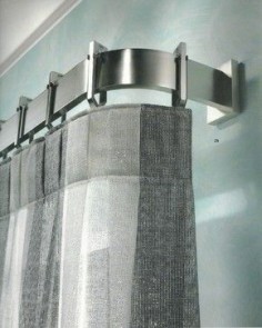 Love this- modern curtain pole. Moving away from uniformity of 'new build' home decor