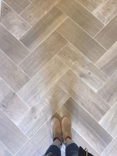 Love wood tile in a herringbone pattern. Such a great look and SO DURABLE! (@Floor & Decor)