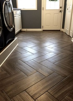 Mudroom flooring. Gray, wood grain tile in herringbone pattern. {a sugared life}