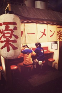Naruto and Sasuke eating ramen cosplay