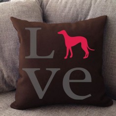 Our LOVE pillow is 16" x16" in size with a zipper cover for easy cleaning. Printed on both sides — Made in USA. Offered in 50 + dog breeds.