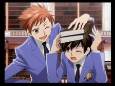 Ouran High School Host Club. Kaoru teasing Haruhi in the library. This image is from the Ouran  DS game.