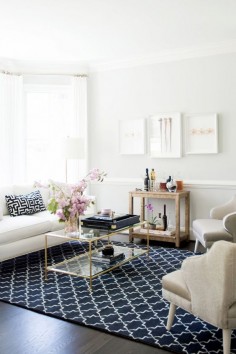 Pattered rug in a neutral room