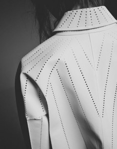 Perforated leather jacket with linear pattern - fabric surface effects; modern textiles; fashion design detail // Issey Miyake