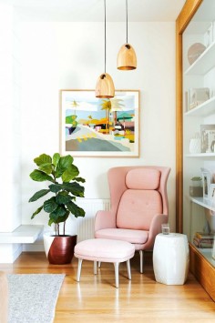 Pink chair and copper lighting