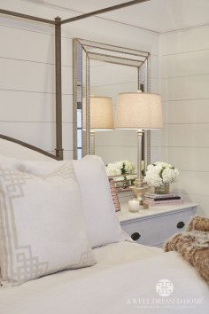 pretty bedroom - shiplap walls, mirror bedsides, iron bed frame, soft whites and neutrals