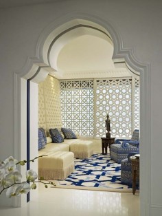 Rich Moroccan living room in subtle colors and light blue