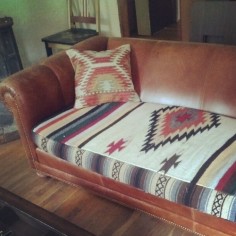 SO BRILLIANT!!!! -- Refurbished couch cushion from a Mexican blanket.