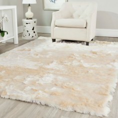 Soft, plush and luxurious, Safavieh's Paris Shag Rug evokes the classic understated elegance and neutral color palette of French Moderne style. The drama of these rugs is in their lush opulent texture.