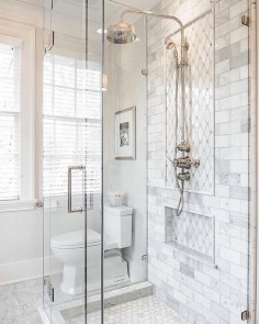 Start your day with something beautiful! We're feeling inspired by this beautiful bathroom from @the_real_houses_of_ig! Get the look with our Reflection Diamond Tile Carrara marble subway tile and carrara hexagon mosaic! #hexes #marble by tilebar