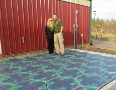 This is Julie and Scott Brusaw, creators of Solar Roadways. Solar Roadways is a modular paving system of solar panels that can withstand the heaviest of trucks (250,000 pounds). These Solar Road Panels can be installed on roads, parking lots, driveways, sidewalks, bike paths,  literally any surface under the sun. They pay for themselves primarily through the generation of electricity, which can power homes and businesses connected via driveways and parking lots.