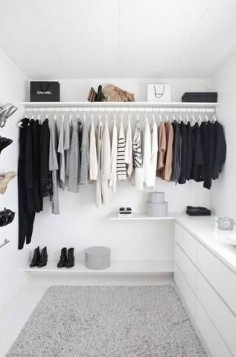 this minimalist closet is absolutely stunning.
