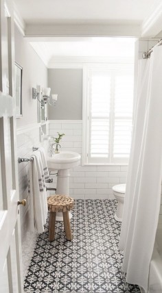 Tile - black and white for shower floor Bathroom with white subway tile and patterned encaustic floor tiles, designed by Vintage Scout Interiors, via @Sarah Sarna - Fashion, Interior Design, + Beauty 