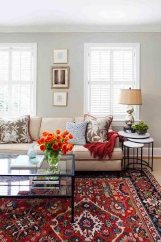 Transitional living room with oriental rug, custom textiles and nesting tables.