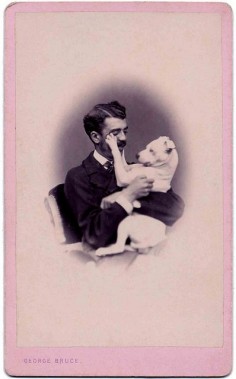 VINTAGE:  A man and his loving Pitbull puppy - quite a bond!  (From the Libby Hall Collection)