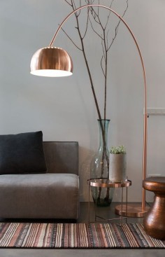 Whether it is metallic lamps and lights or accessories - everything from the warm brass and copper to the colder steels are a hot trend for 2015. Used right, it surely adds a touch of glam to any contemporary home.