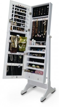 You'll enjoy storage galore with our Wessex Floor Mirror. Not only does it reflect via its center-hinge-tilting mirror, it opens up to reveal an extensive jewelry cabinet featuring six shelves, two pull-out drawers and an abundant supply of hooks. Whether you need to store earrings, rings, necklaces, bracelets, scarves or sunglasses, this is the floor mirror for :Standing Body-Length Floor Mirror with Integrated Jewelry CabinetDressing mirror opens to reveal a jewelry
