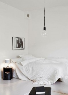 black and white minimal bedroom / white linen / white floor / simple hanging  love white interiors! x