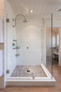 Chic swanstone in Bathroom Beach Style with Shower Stall next to Ceramic Tile Walk In Showers alongside Tile And Wood Flooring and Floor Tile