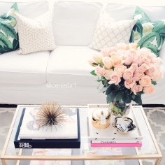 Coffee table styling, Tom ford, chanel, banana Palm pillow, gold coffee tAble, table books