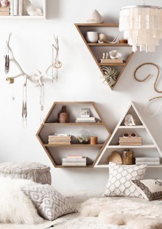 Featuring natural colors and clean lines, geometric wall shelves yield center stage to the items stored within.