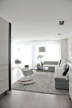 grey rocking chair lamps lighting sofa white carpet