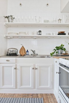 kitchen white tiles open shelves