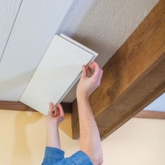 Lowes Creative Ideas tutorial on using planks + a track to cover a popcorn ceiling. Nice alternative to the possible asbestos removal!