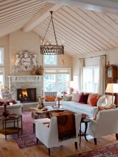 Soft pinks mix with deep reds and purples in Sarah Richardson's living room.