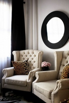 Studded chairs + leopard accent pillows