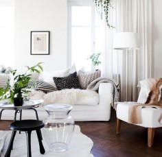 White living room with accent furs and textures